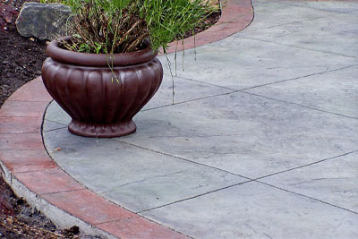 View a variety of projects using stamped and stenciled concrete to replicate the texture and shape of stonework for exterior surfaces